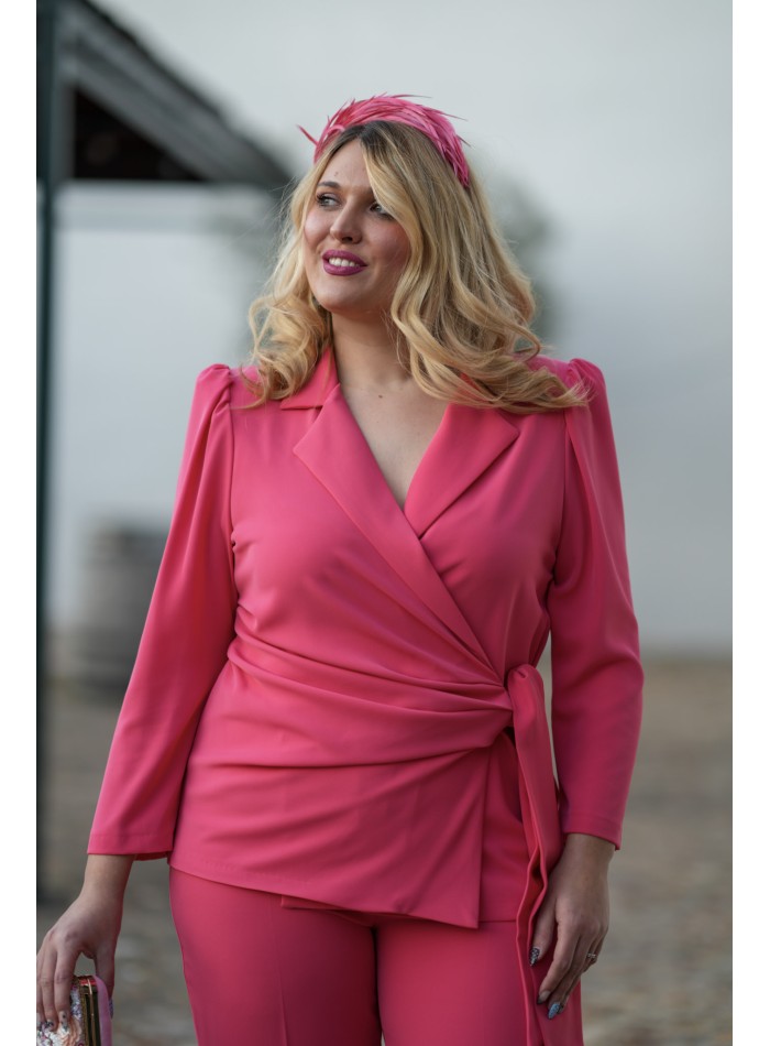 Coral two-piece ensemble of a cross over blouse...