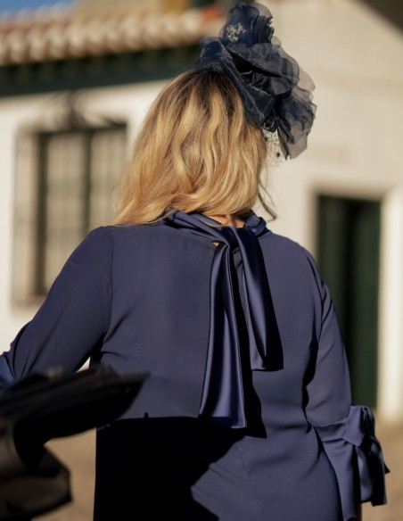 Navy blue two-piece set of straight pants and blouse with lacing