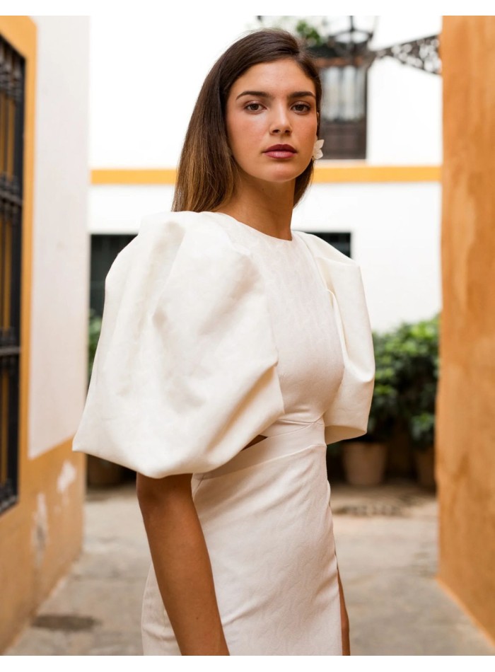 Vestido midi con manga abullonada y cut-outs para invitada