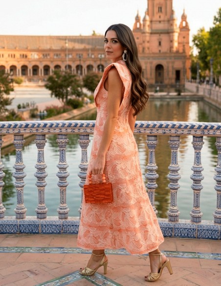 Coral midi dress with white embroidery and shoulder pads