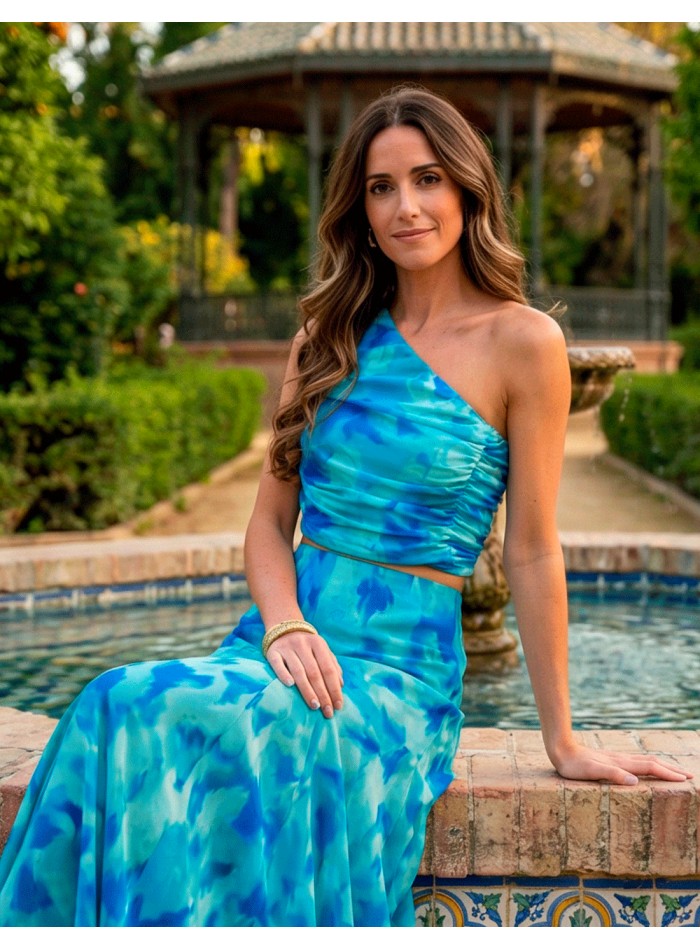 Blue printed chiffon guest ensemble with one shoulder top and midi skirt