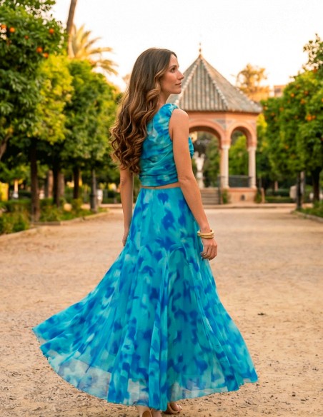 Blue printed chiffon guest ensemble with one shoulder top and midi skirt