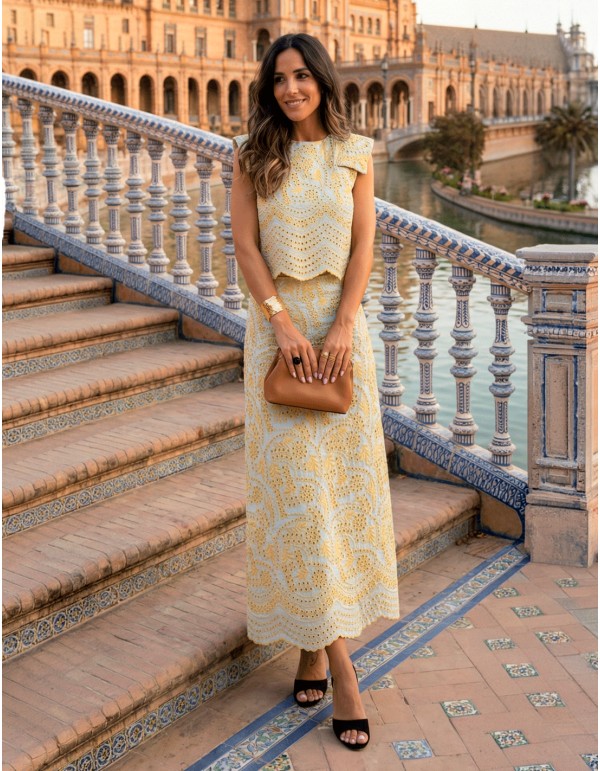 Yellow die-cut set of structured top with shoulder pads and mermaid skirt