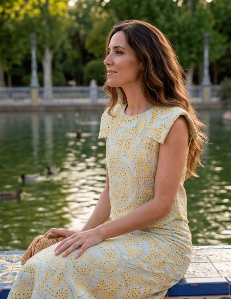 Yellow die-cut set of structured top with shoulder pads and mermaid skirt
