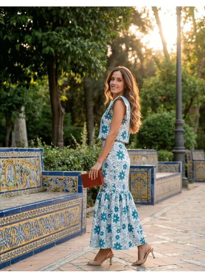 Blue embroidered ensemble with structured top...