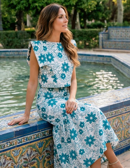 Blue embroidered ensemble with structured top and mermaid midi skirt