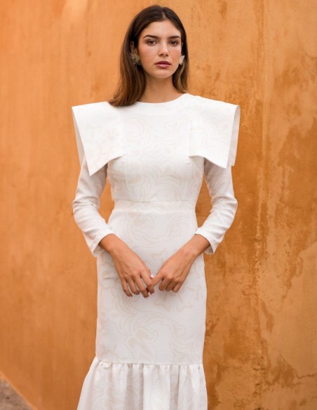 Straight cut white midi dress with ruffle at the hem