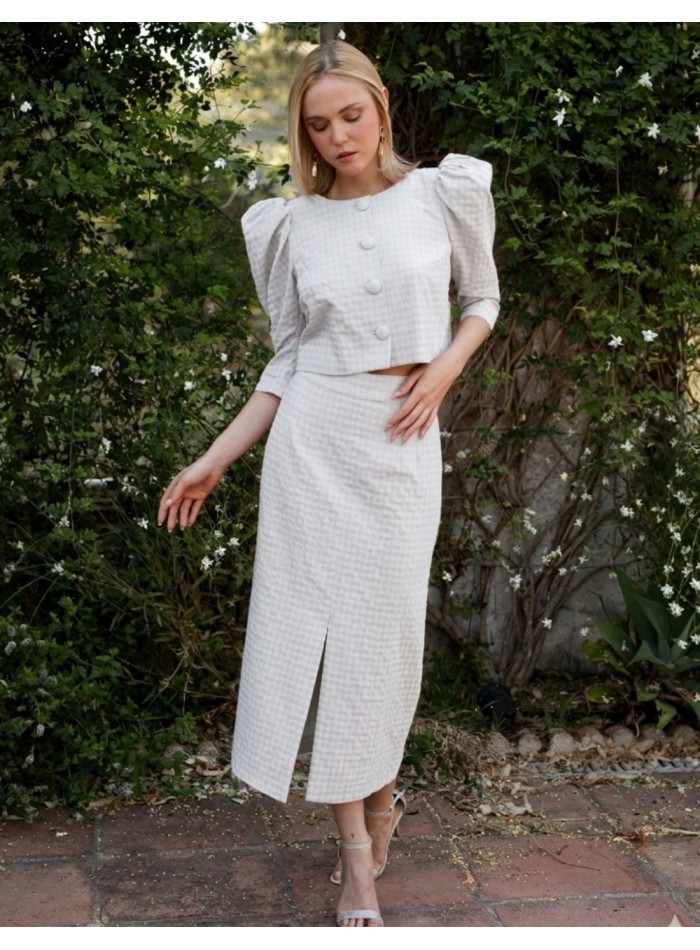 Two-piece white tweed set with puffed sleeves