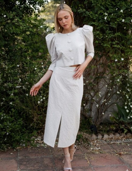 Two-piece white tweed set with puffed sleeves