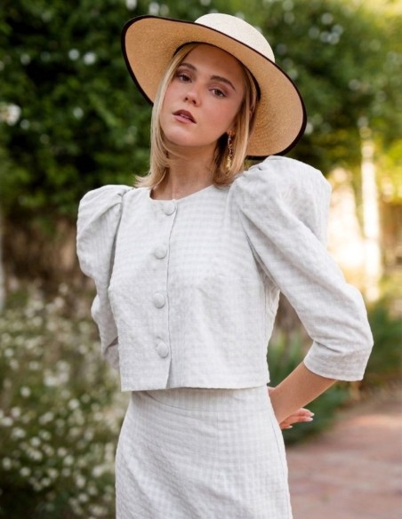Two-piece white tweed set with puffed sleeves