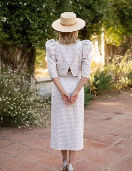 Two-piece white tweed set with puffed sleeves