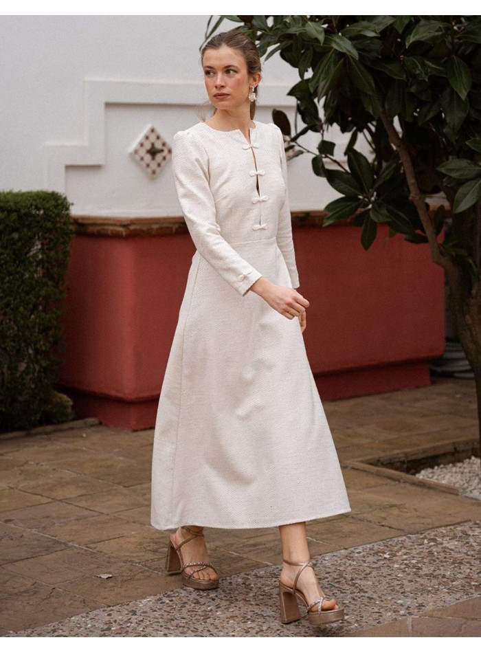 Robe midi en tweed beige avec une jupe...