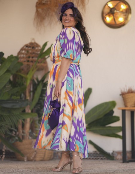 Vestido midi de invitada con tejido fluido estampado para primavera