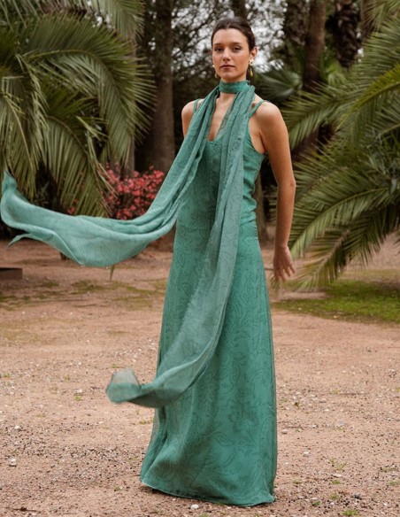Long emerald green chiffon dress with floral print and cape