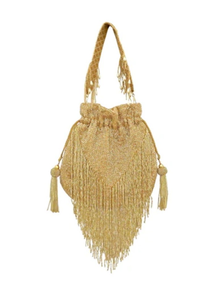 Handmade handbag with bangs in golden color