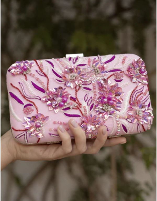 Sac à main rose pour invités avec perles de bougainvilliers