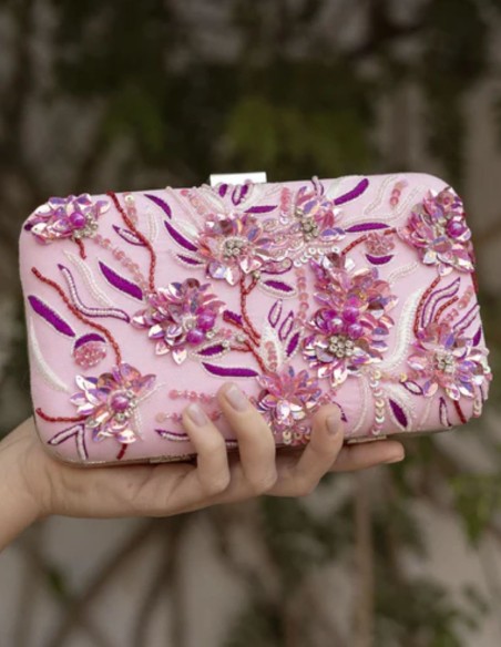 Sac à main rose pour invités avec perles de bougainvilliers