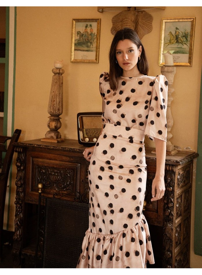 Falda midi con estampado de lunares y bajo de...
