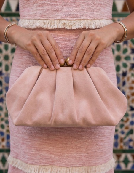 Pale pink suede handbag for guests