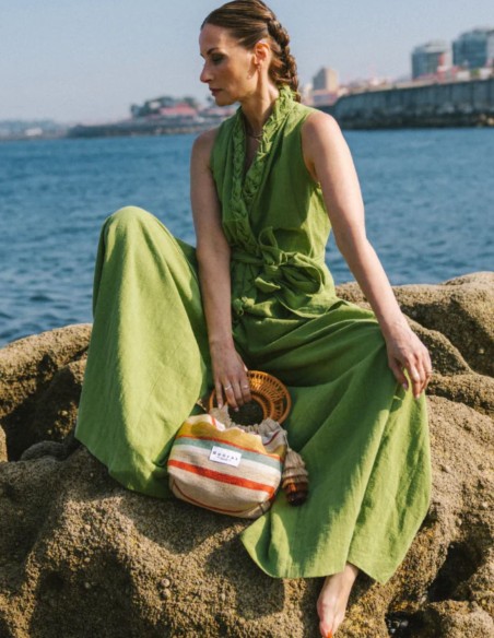 Striped upholstery fabric bag with rattan handles