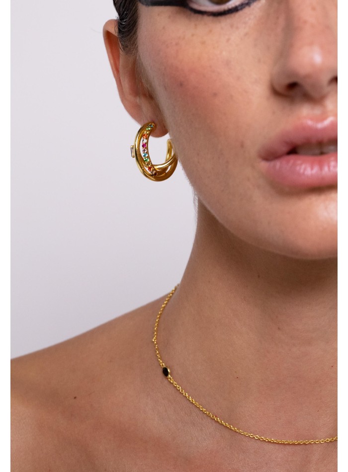 Triple golden earrings with colored stones
