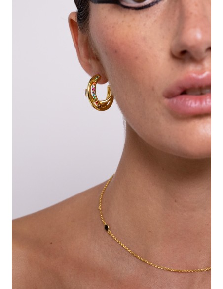 Triple golden earrings with colored stones