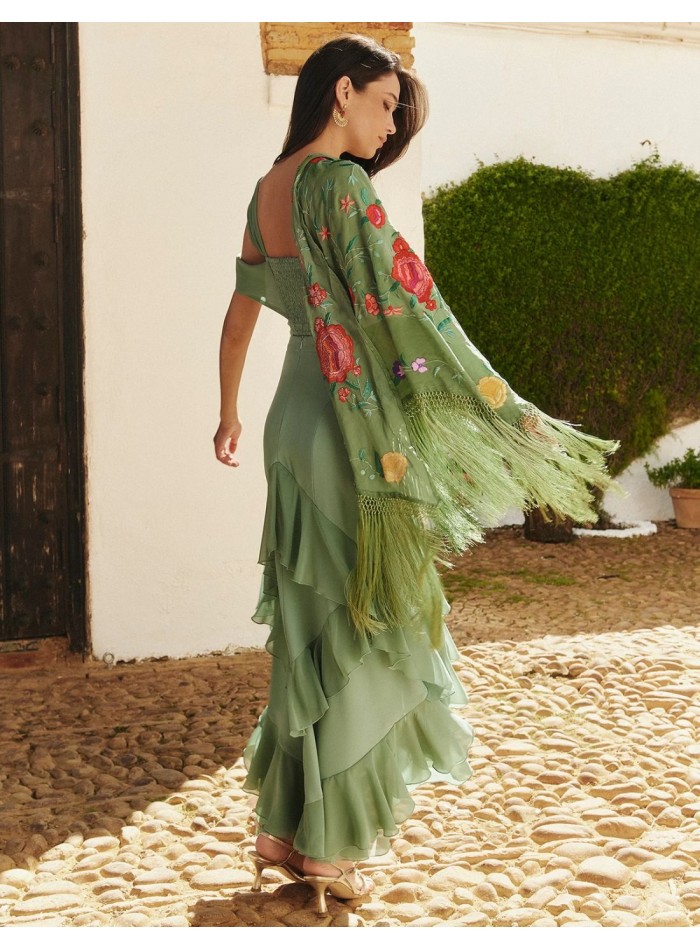 Top verde empolvado con escote asimétrico