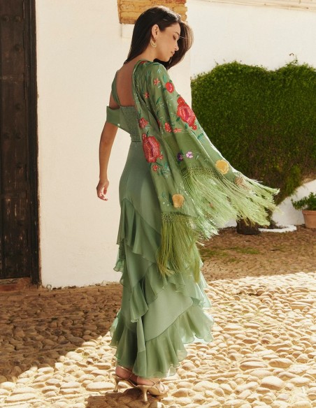 Powdered green top with double asymmetrical criss-crossing made in crepe