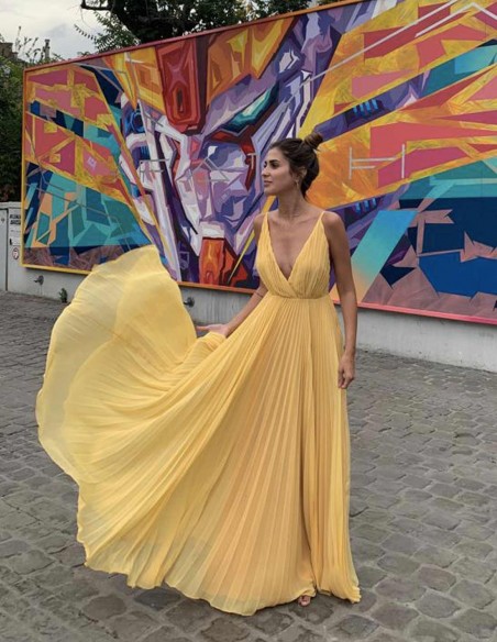 Yellow pleated long dress with V neckline for wedding guests