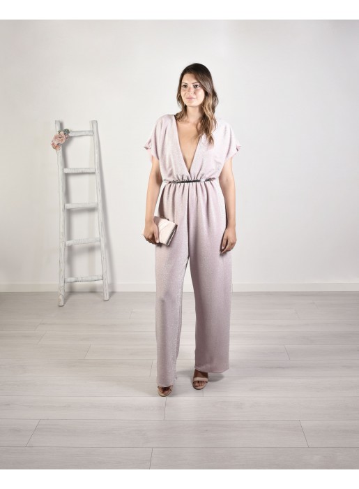 Long jumpsuit with a shiny finish and a pronounced neckline