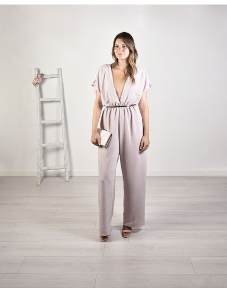 Long jumpsuit with a shiny finish and a pronounced neckline