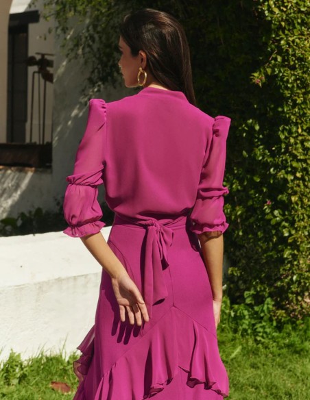 Bougainvillea party crop top in flowing fabric with V-neckline and front lacing