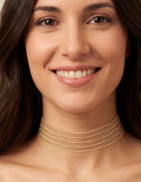 Tour de cou en or avec fil pailleté pour les invités