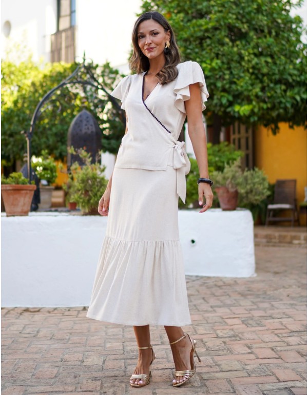 Ensemble deux pièces avec jupe midi et top avec laçage...