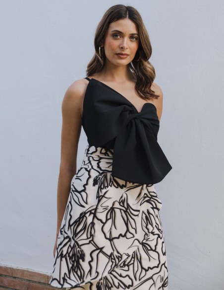 Jupe midi en tissu imprimé noir et blanc avec volant