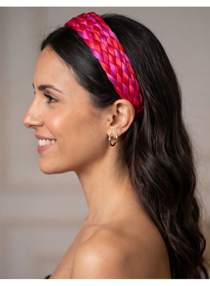 Diadema trenzada en raso en tonos rosa y rojo