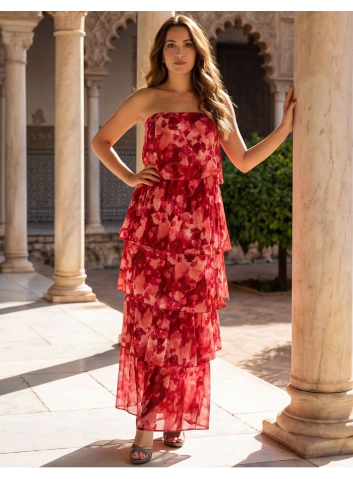 Vestido midi estampado en tonos rosas y rojos con palabra de honor y volantes