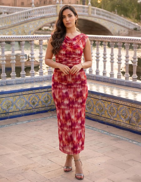 Printed midi dress with pink and orange tones with draping