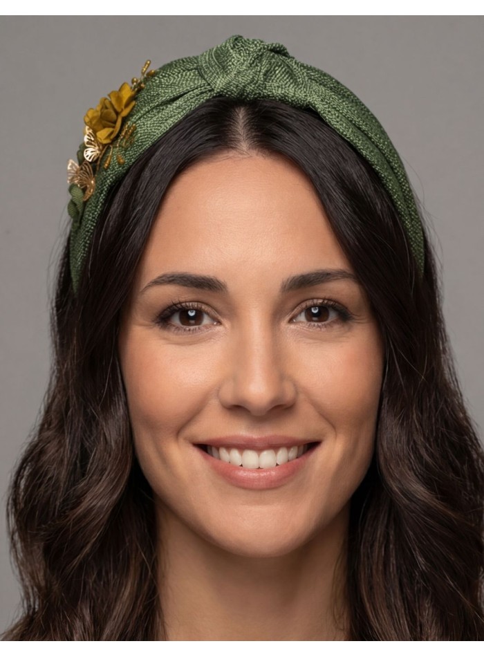 Headband made of green silk sinamay with flower...
