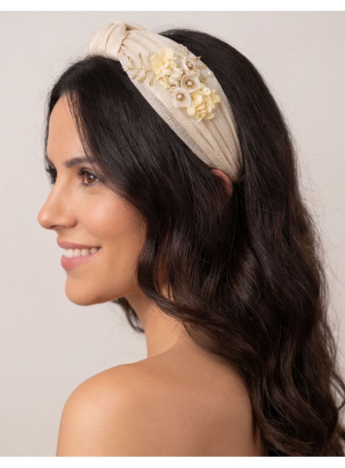 Headband made of beige silk sinamay with flower...