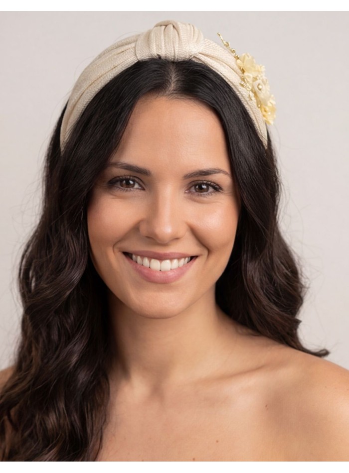 Headband made of beige silk sinamay with flower...