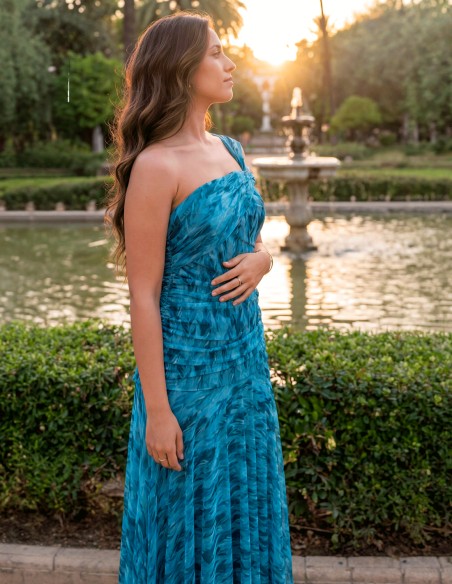 Printed midi dress in blue tones with asymmetrical neckline