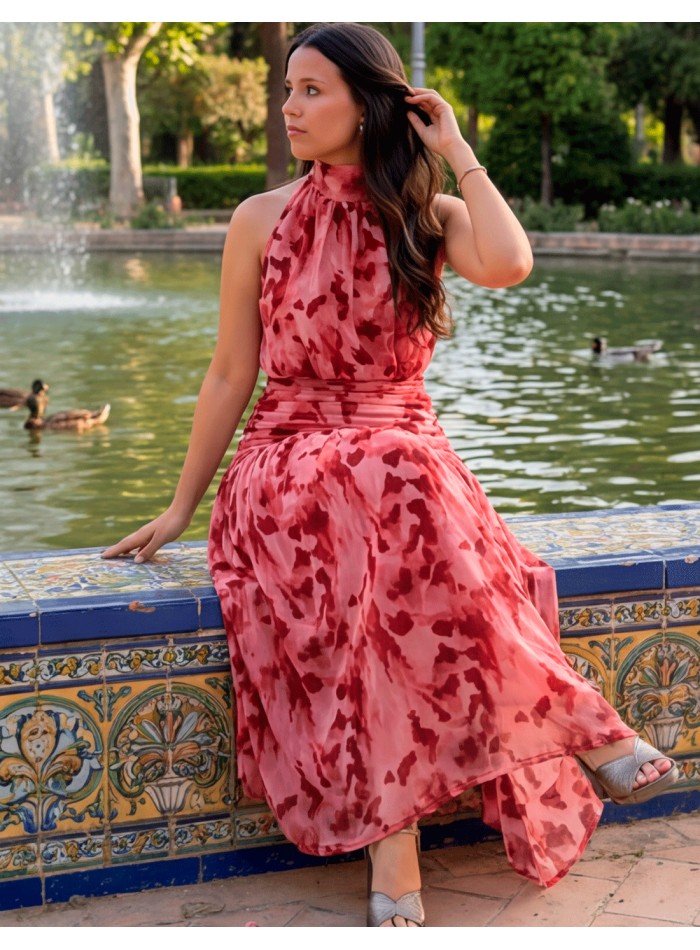 Robe midi dos nu imprimée dans les tons roses...