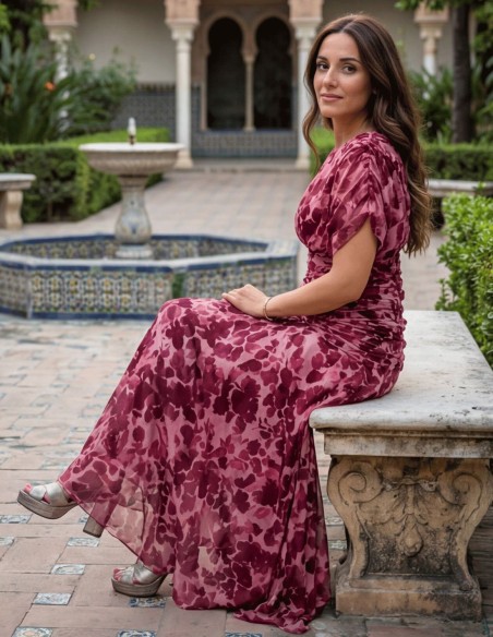 Midi dress with pink floral print and draped at the waist