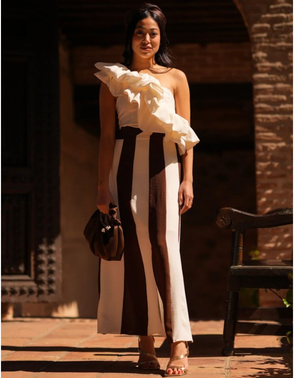 Two-piece asymmetrical ruffled top and striped midi skirt...