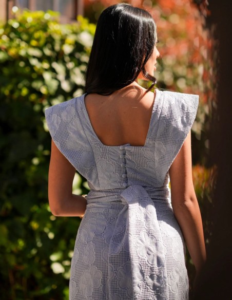 Light blue two-piece perforated fabric top and skirt set
