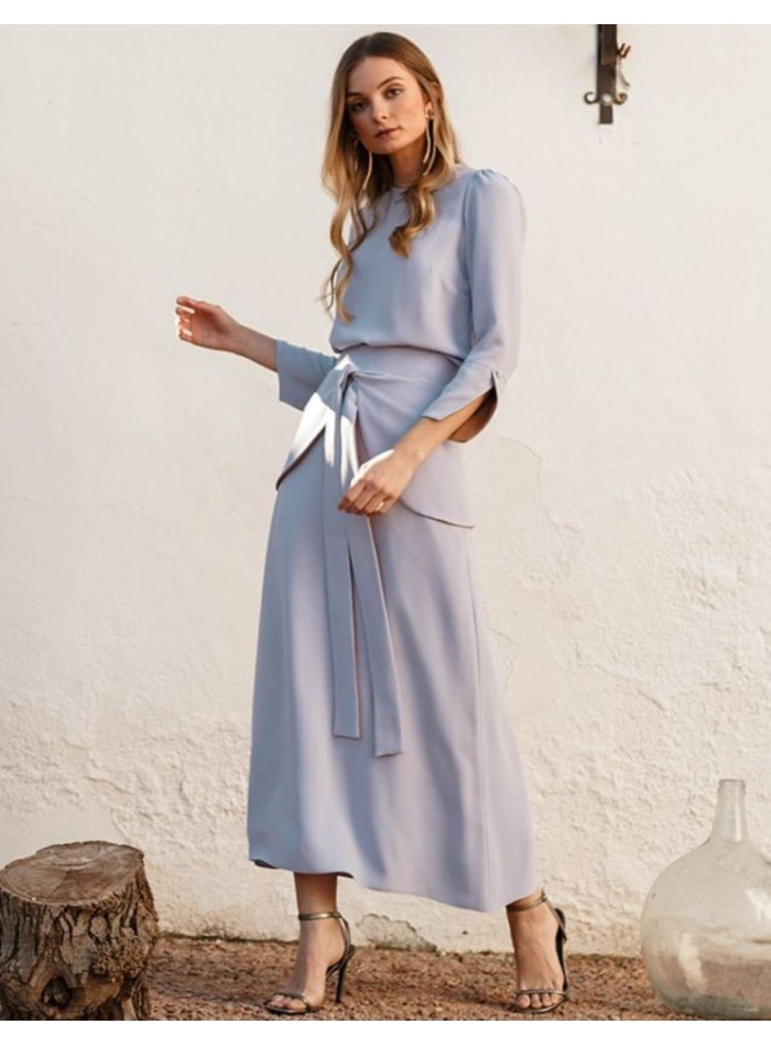 Flared skirt in lavender color with ruffle at...