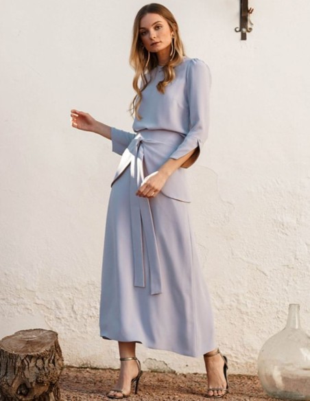 Flared skirt in lavender color with ruffle at the waist with lacing