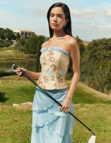 Top corset sans bretelles avec broderie baroque dans les tons sable et détails bleus