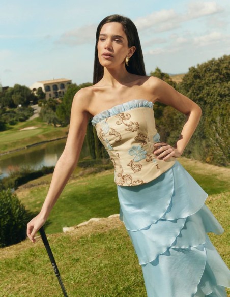 Top corset sans bretelles avec broderie baroque dans les tons sable et détails bleus